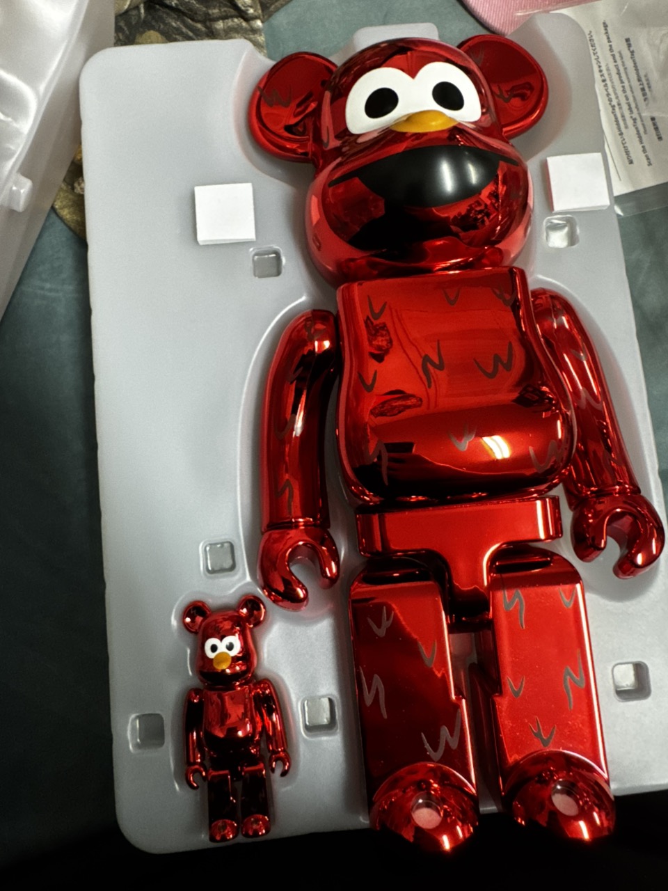 Bearbrick Sesame Street Elmo 10 chrome ($259.99) from @Print_Dr